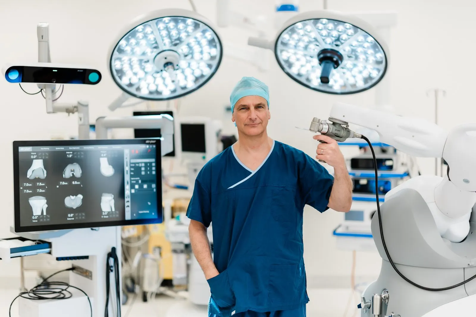 Dr Limbers assessing a patient's knee